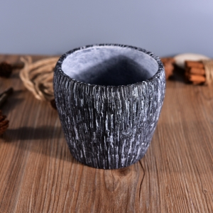 Decorative empty concrete candle holder