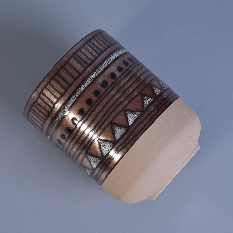 Metal finish hand made ceramic candle holder with geometric painted