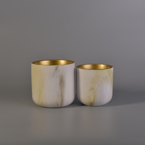 Transfer printing  ceramic candle containers with gold painting