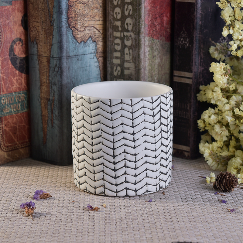 Novel debossed black painted cylinder ceramic candle jars wholesale