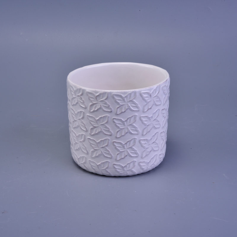 matte white ceramic candle holder with embossed pattern
matte white ceramic candle holder with embossed pattern