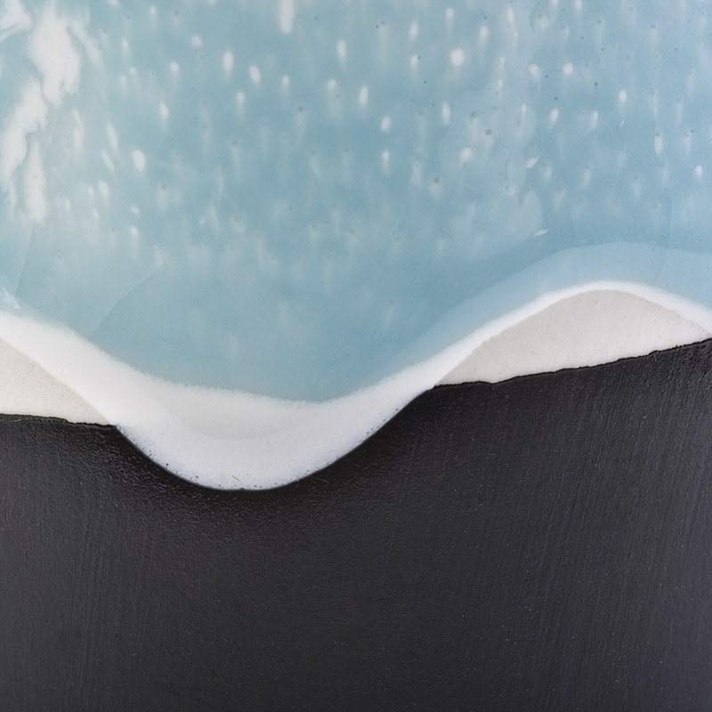 Flowing sand effect ceramic candle holder with lid 