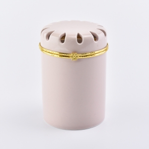 Ceramic candle jar with decorative lid
