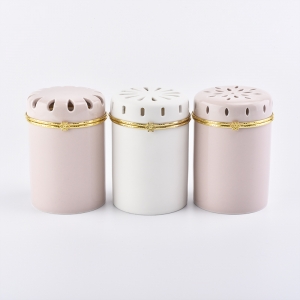 Barattolo di candela bianco in ceramica con coperchio cavo