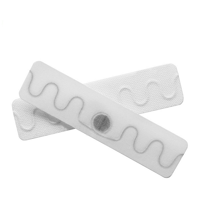 Dostawca fabryki w Chinach 70 * 15 mm Wodoodporna, zmywalna etykieta materiałowa UHF RFID Tag do prania do zarządzania bielizną odzieżową