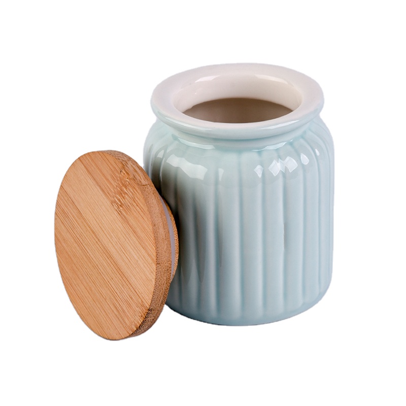 Light blue round ceramic candle jar with wood lid for home decoration
