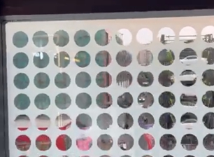 The purpose of the small black dot on the glass