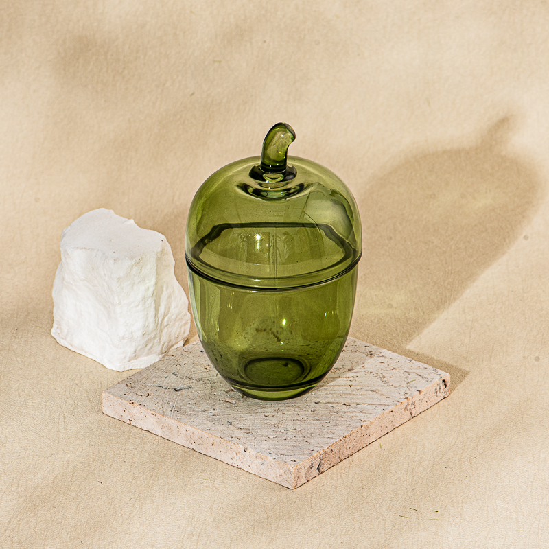 Frascos de velas de vidrio con forma de manzana soplados a mano al por mayor con tapas