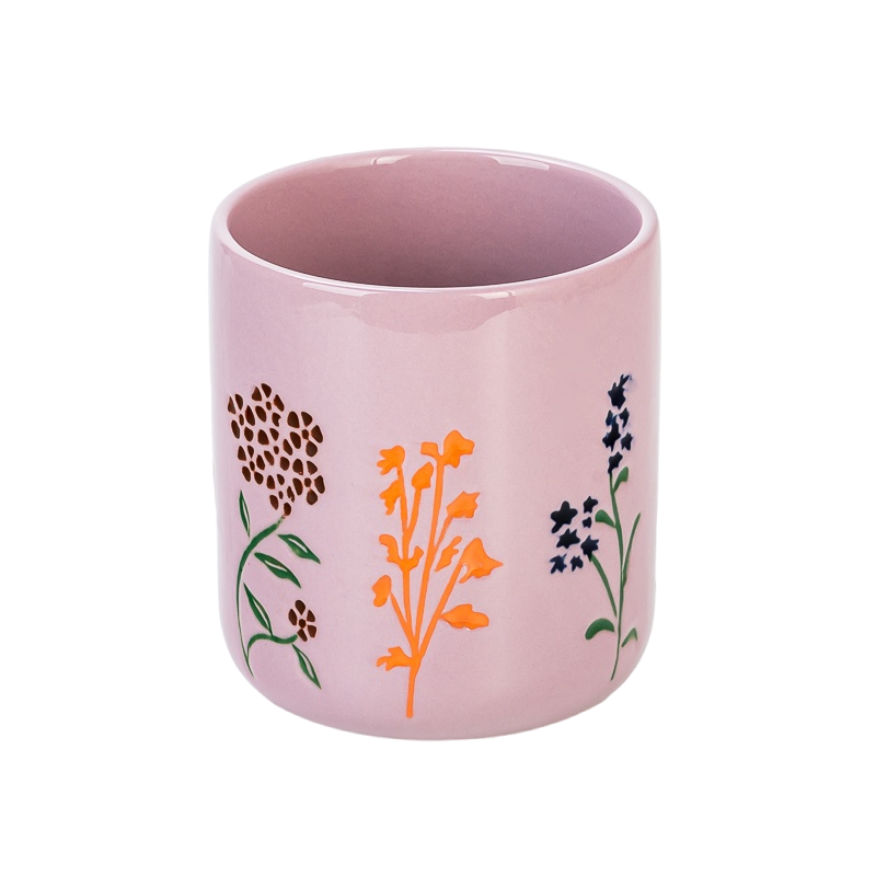 Tarros de velas de cerámica con relieve de flores silvestres de color rosa polvoriento al por mayor