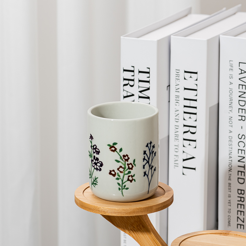 Frascos de vela de cerámica de flores silvestres en relieve blanco crema al por mayor