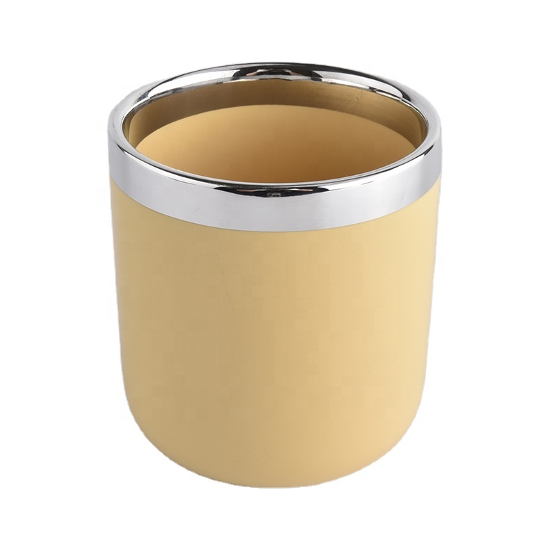 milky yellow glazed ceramic candle holders