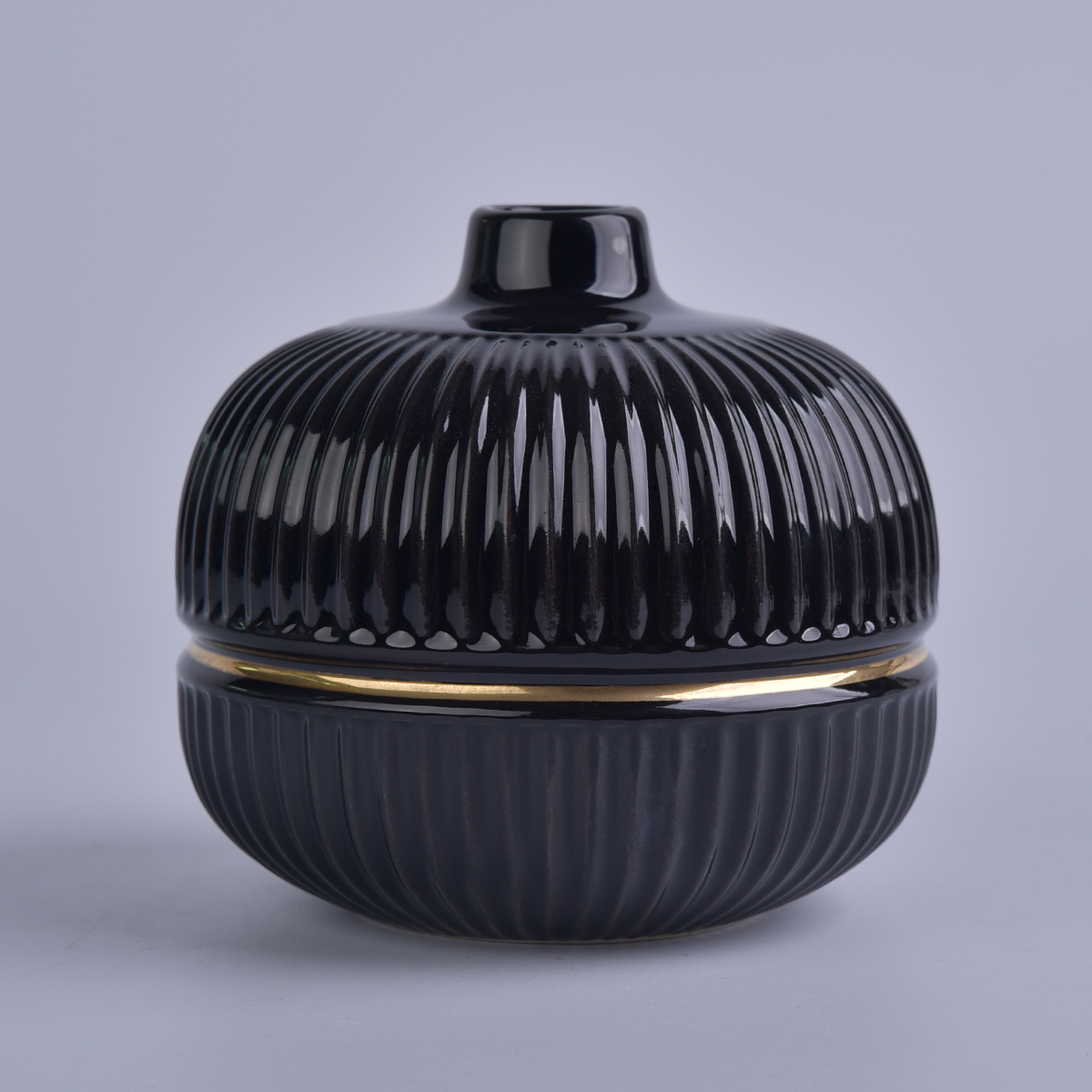 glossy black round ceramic bottle with gold ring, ceramic diffuser bottles for home