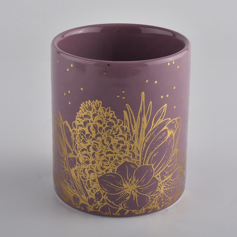 pink glazed ceramic candle jars with gold printing