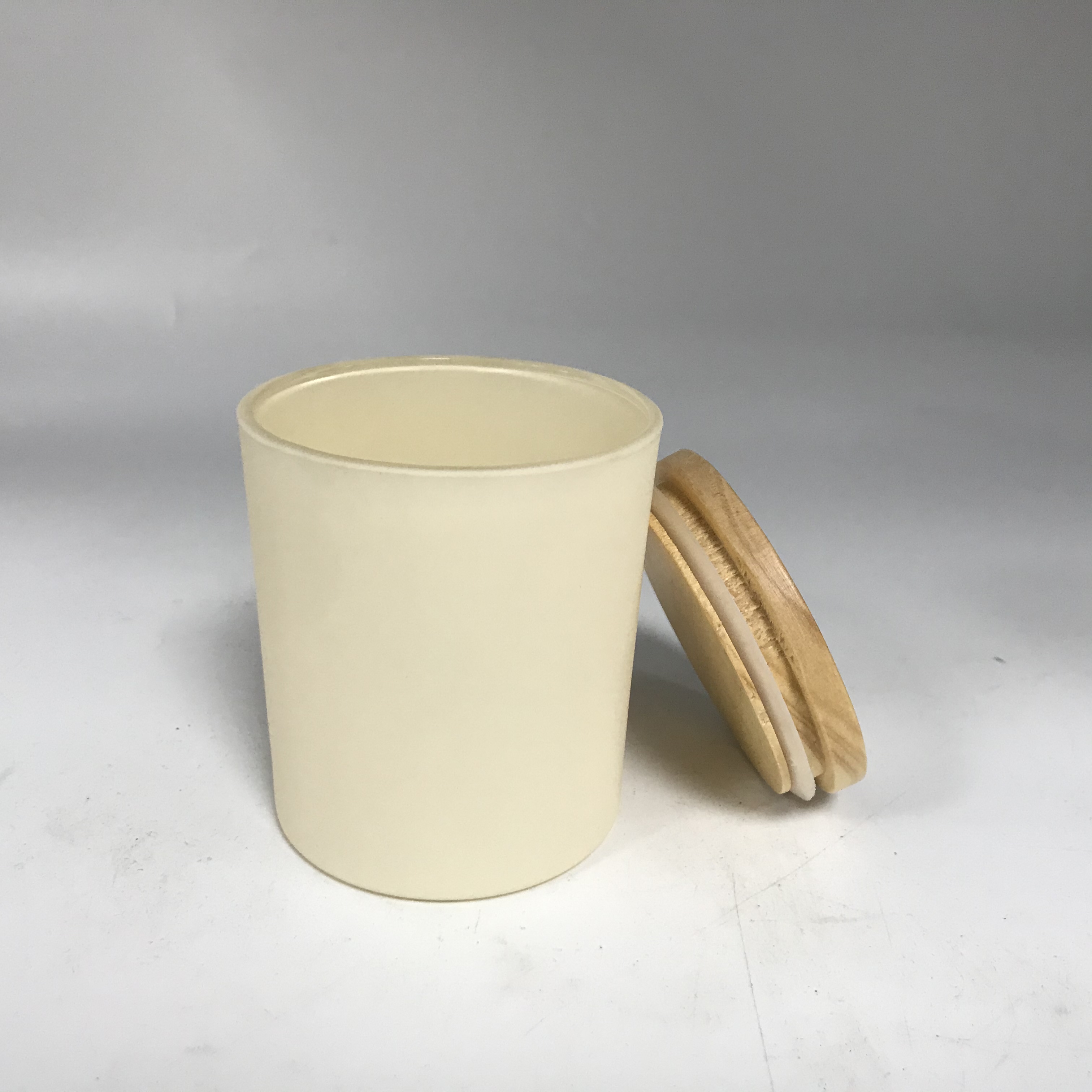 off-white glass candle jars with wood lid