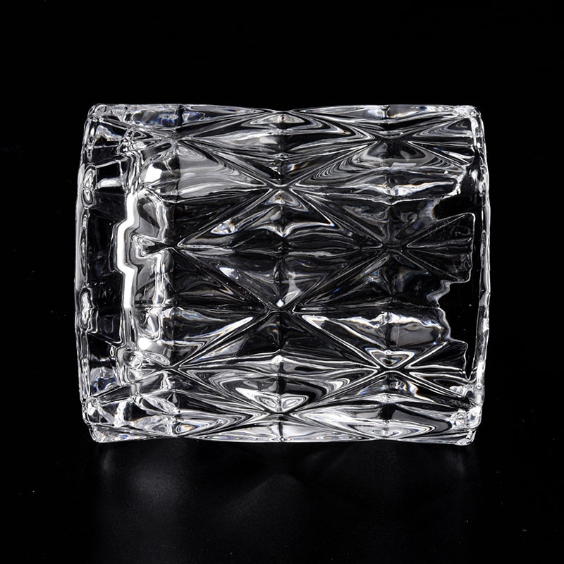 high white glass candle jars with cut geo designs