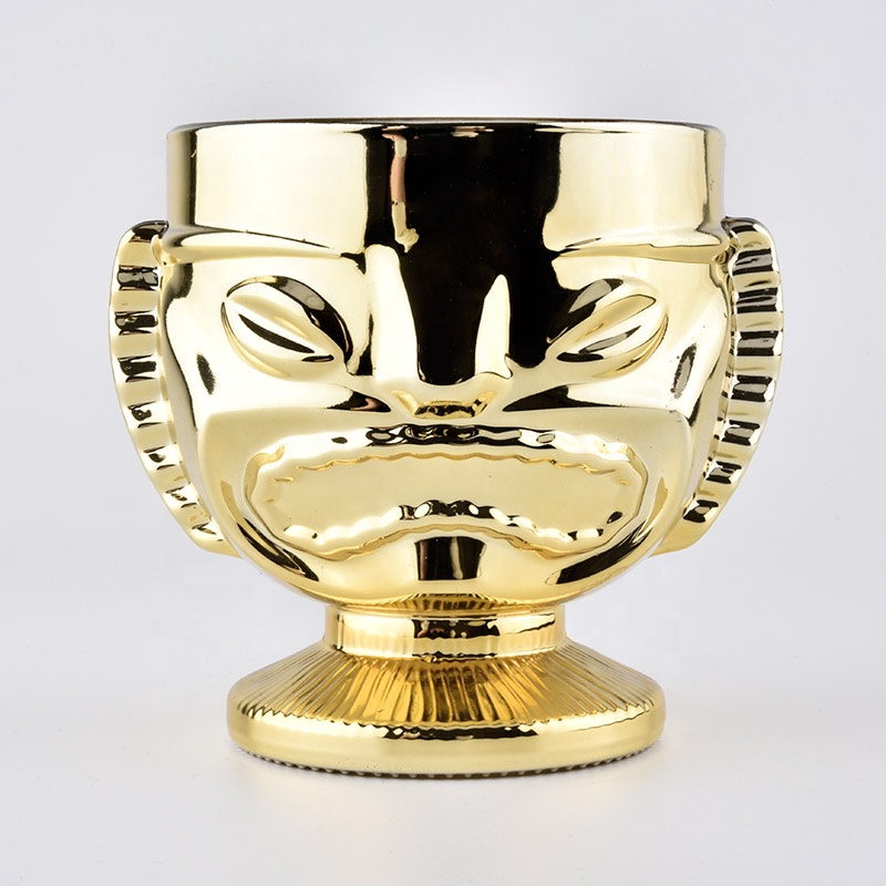 trophy shaped gold glass candle jars