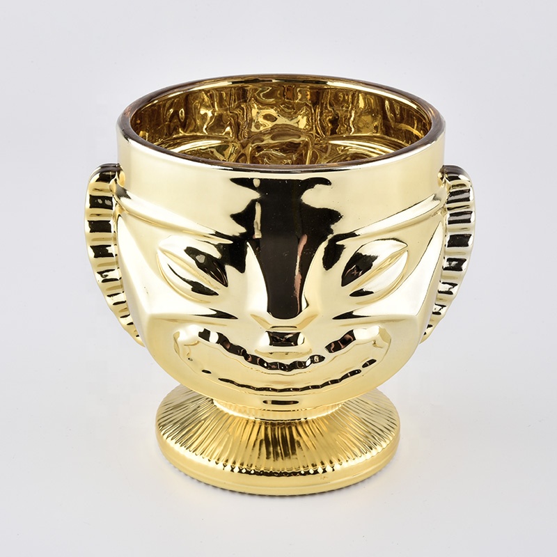 trophy shaped gold glass candle jars
