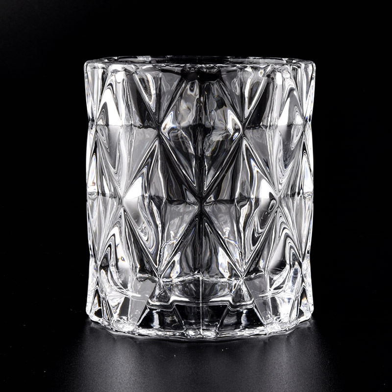 high white glass candle jars with cut geo designs