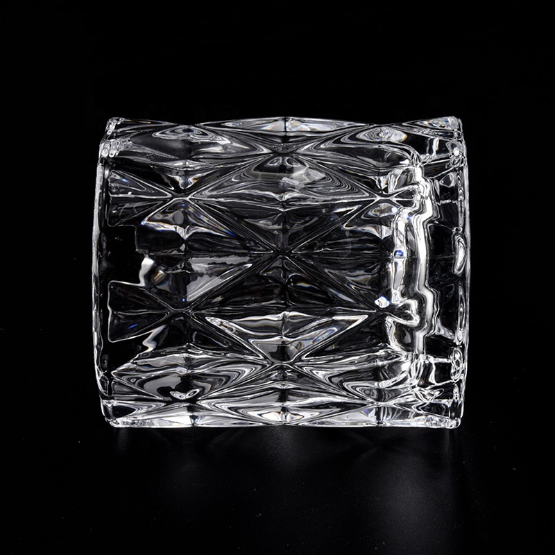 high white glass candle jars with cut geo designs