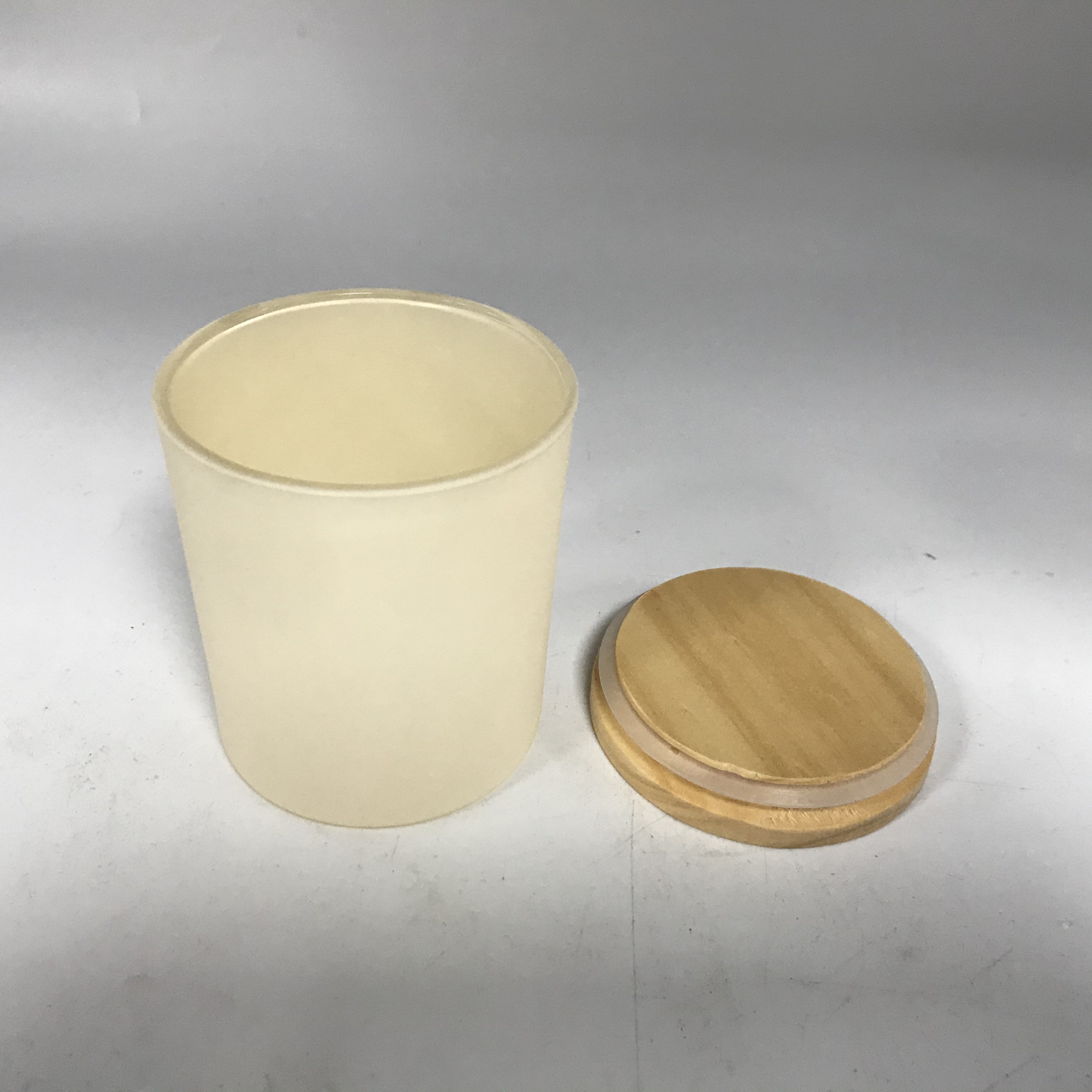 off-white glass candle jars with wood lid