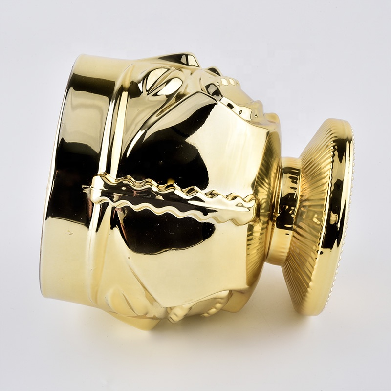 trophy shaped gold glass candle jars