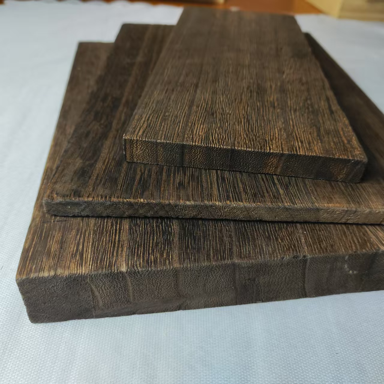 Innovative Processes for Heavily Flamed Paulownia Boards