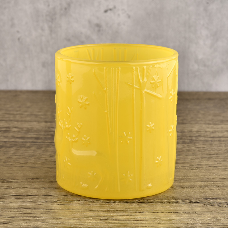customized yellow colored glass candle jar with home decor