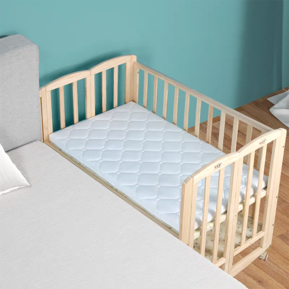 China Customizable Solid Beech Wood Extra Wide Bedside Infant Bed with Elevated Guardrail for Living Room Baby Bed manufacturer