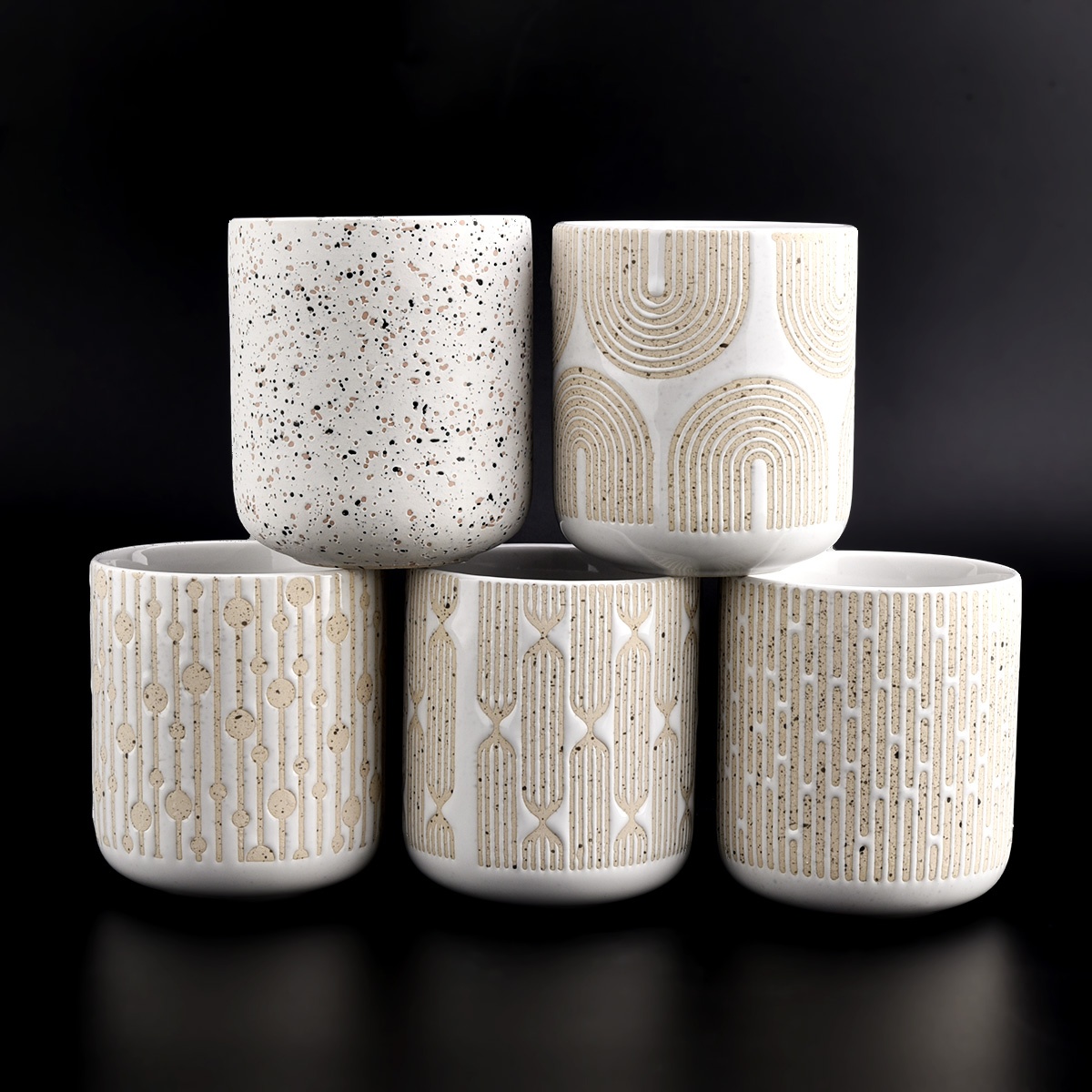 Ceramic candle jar with sand surface pattern