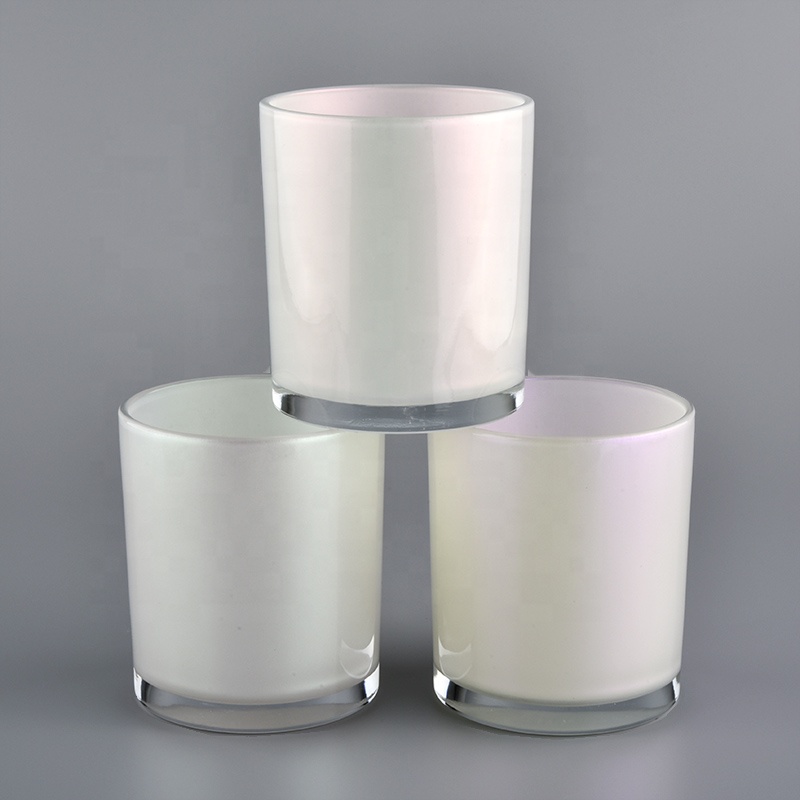 white iridescent candle holder with spraying color inside