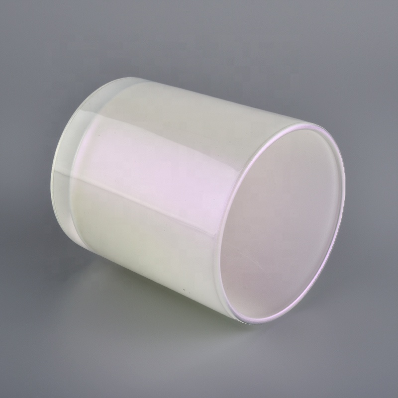 white iridescent candle holder with spraying color inside