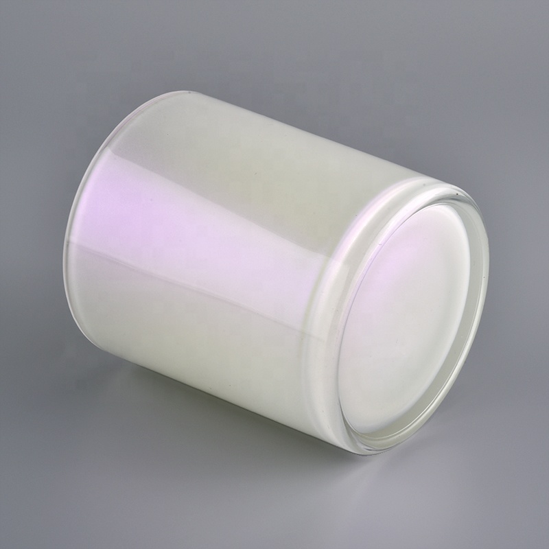 white iridescent candle holder with spraying color inside