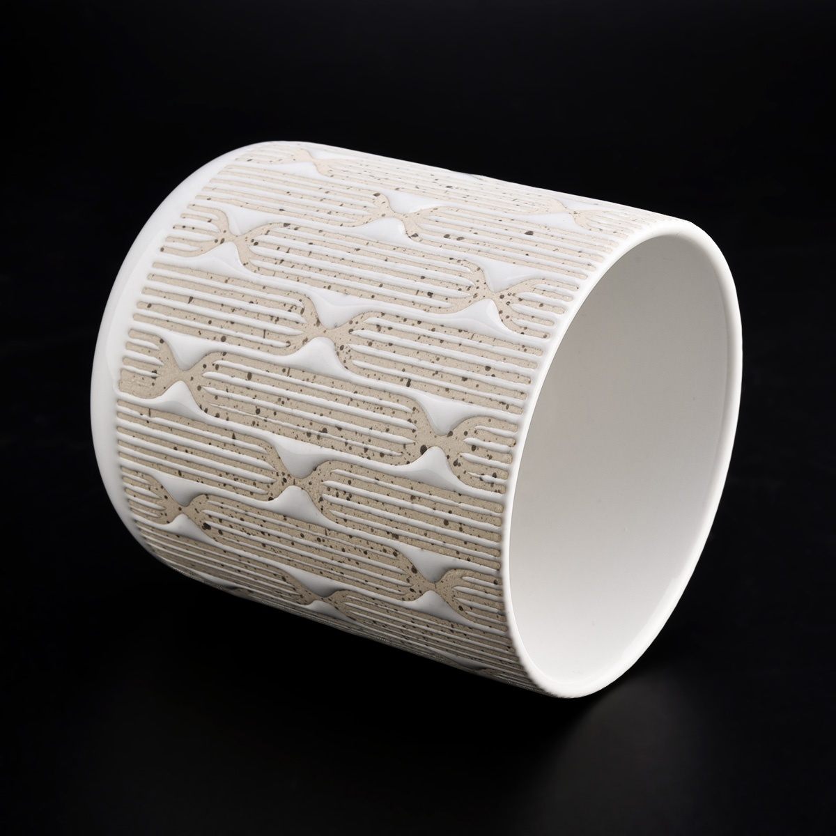 Ceramic candle jar with sand surface pattern