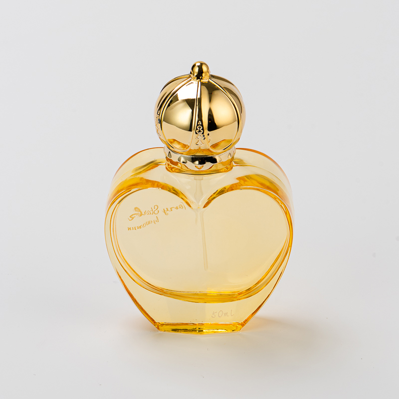 サプライヤー50mlのラブシェイプガラス香水ボトルとゴールドキャップ