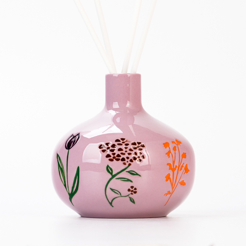 Bottiglia in ceramica con aroma smaltato rosa con motivo fantasia all'ingrosso per fragranze