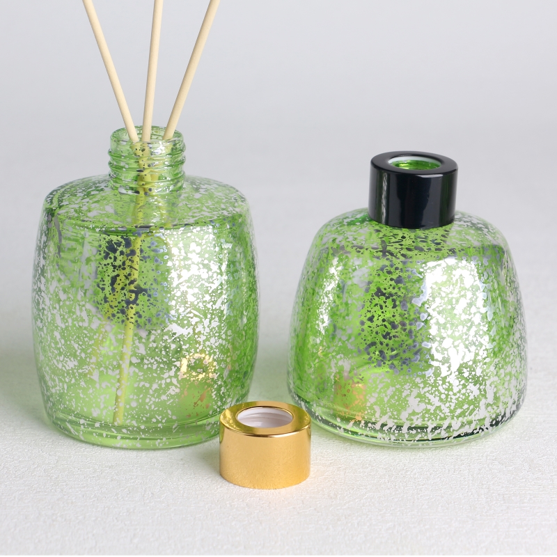 transparent green electroplated laser fleck finished ink bottle shaped glass diffuser bottle