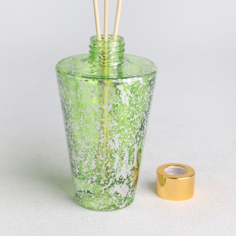 transparent green electroplated laser fleck finished glass diffuser bottle