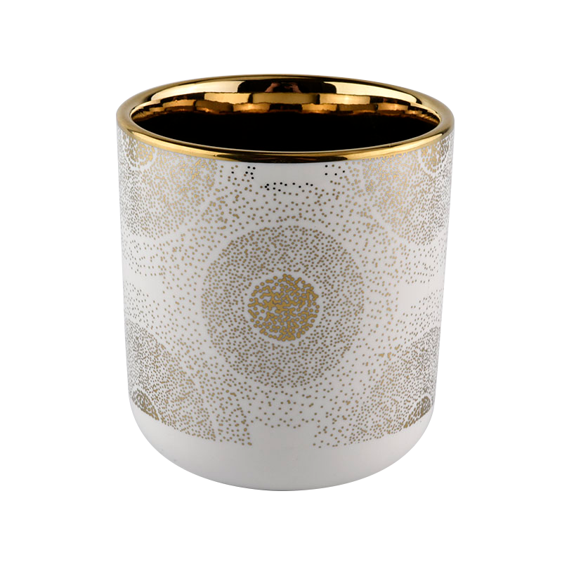 white ceramic candle vessel with gold rim and unique pattern