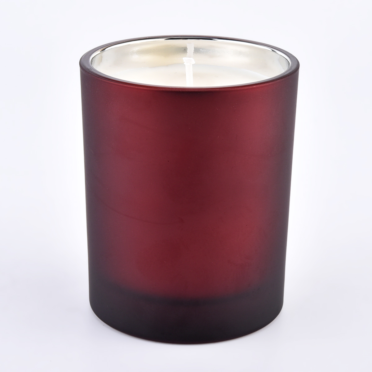glass candle jar with metallic silver inside and matte outside