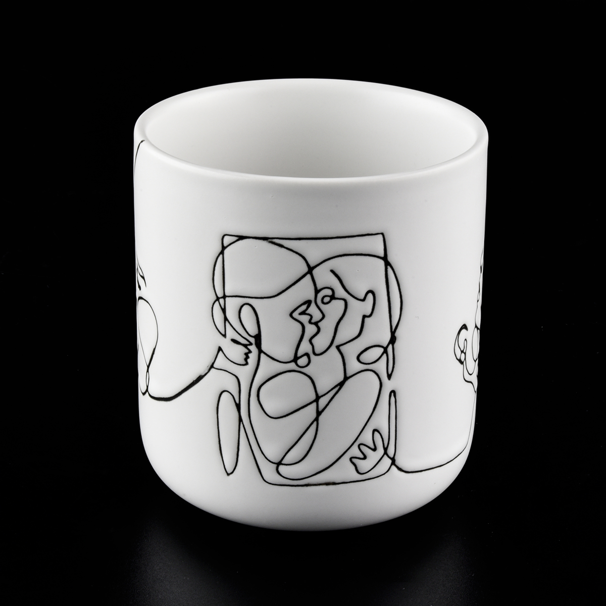 white ceramic vessels with black line print