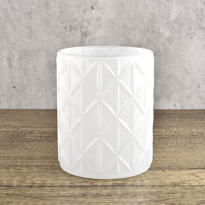 white glass candle vessels with geo cut design