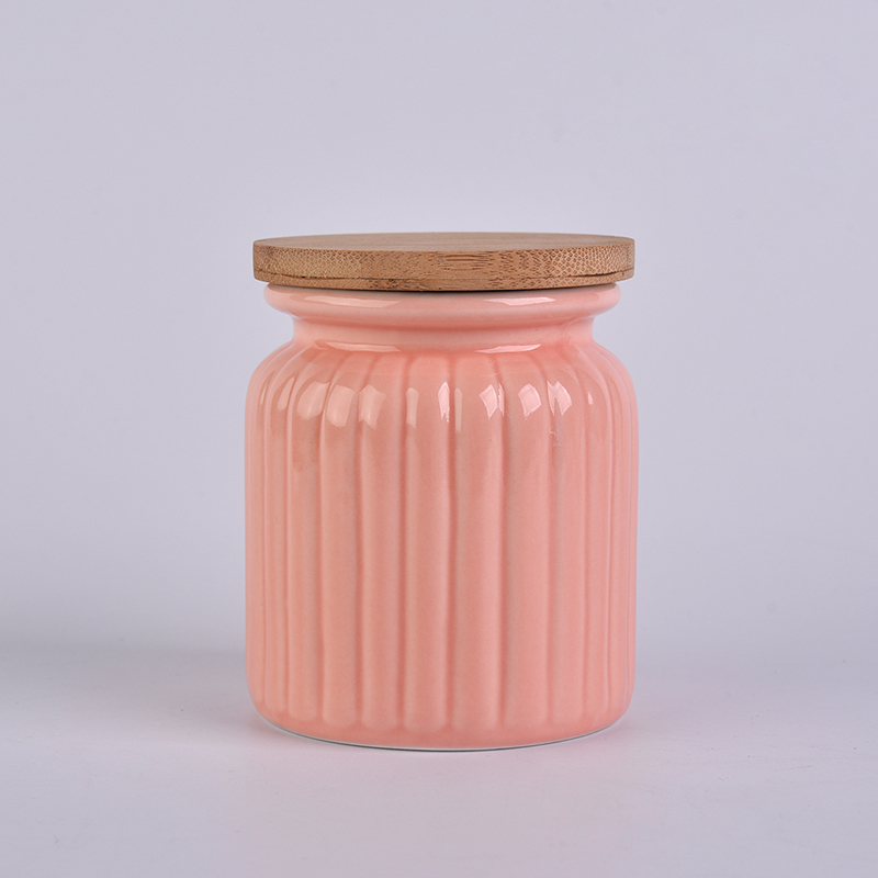orange ceramic candle jar with bamboo lid