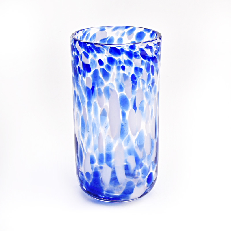 hand made glass vessels with colorful decorative spots