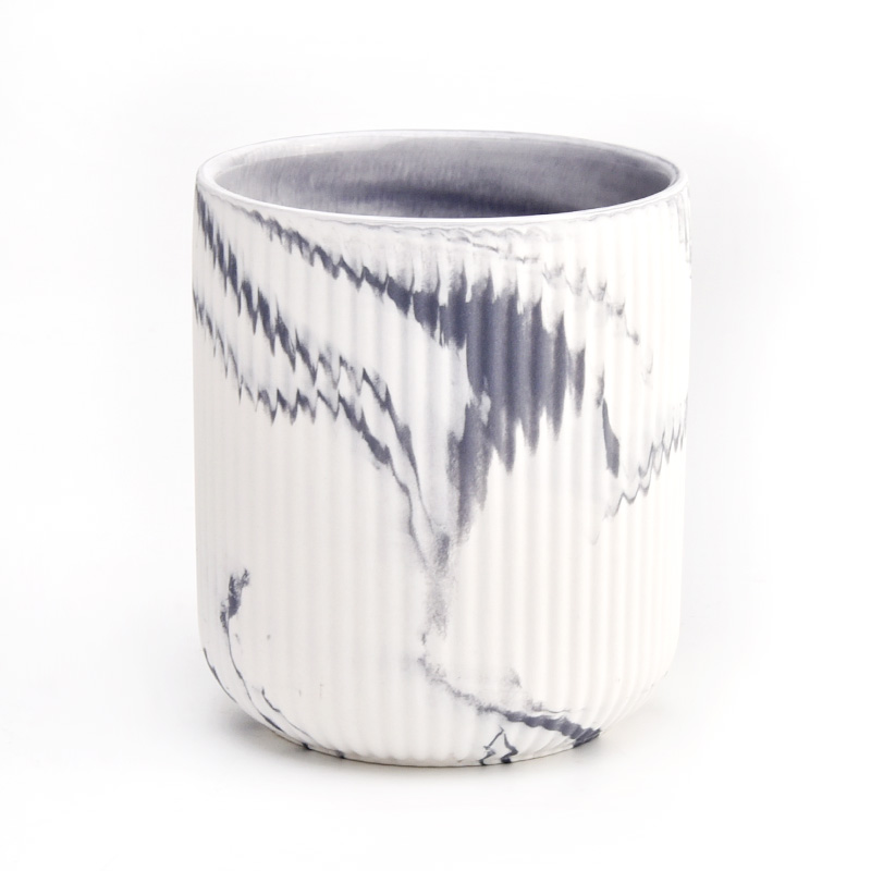 black and white mixed colored fluted ceramic jar