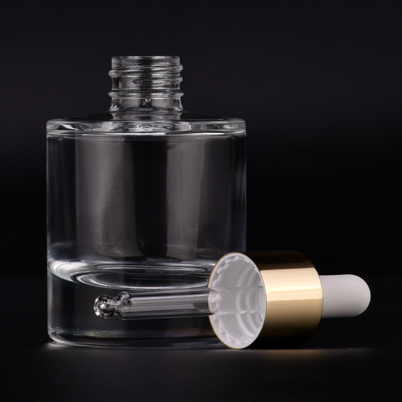 Newly design for luxury 50ml glass bottle with gold dropper for wholesale