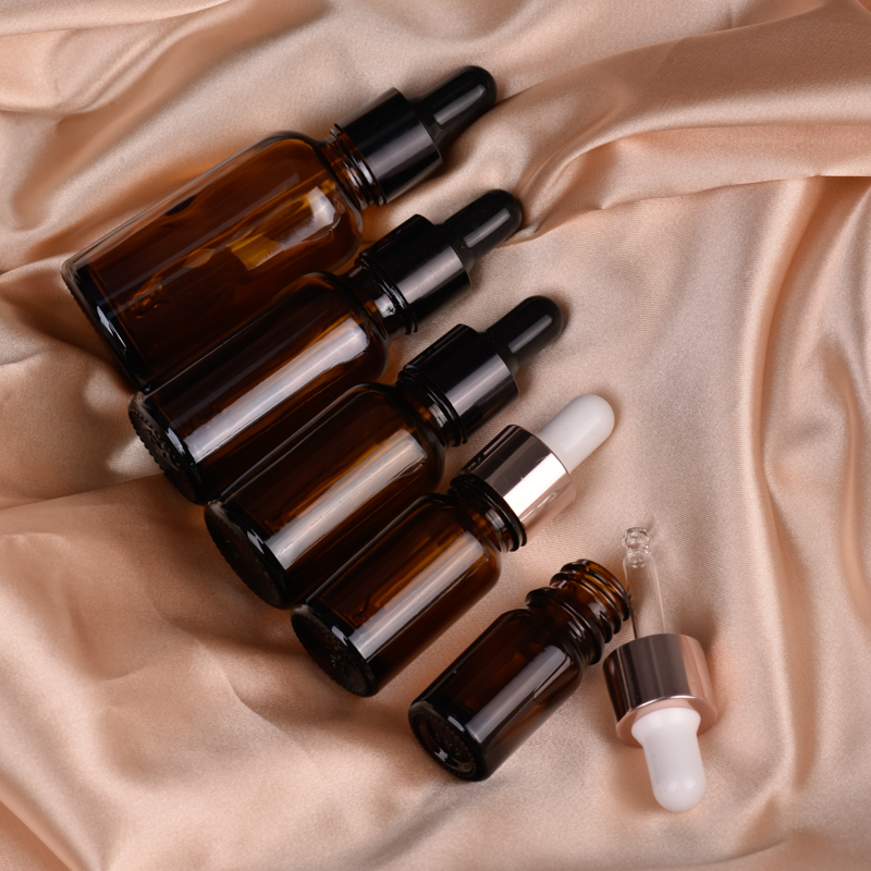 Frasco de vidro âmbar popular de 30ml com gotas para fornecedor