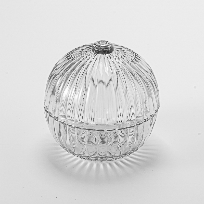 Vasos de vela de vidro de bola redonda populares com tampas no atacado