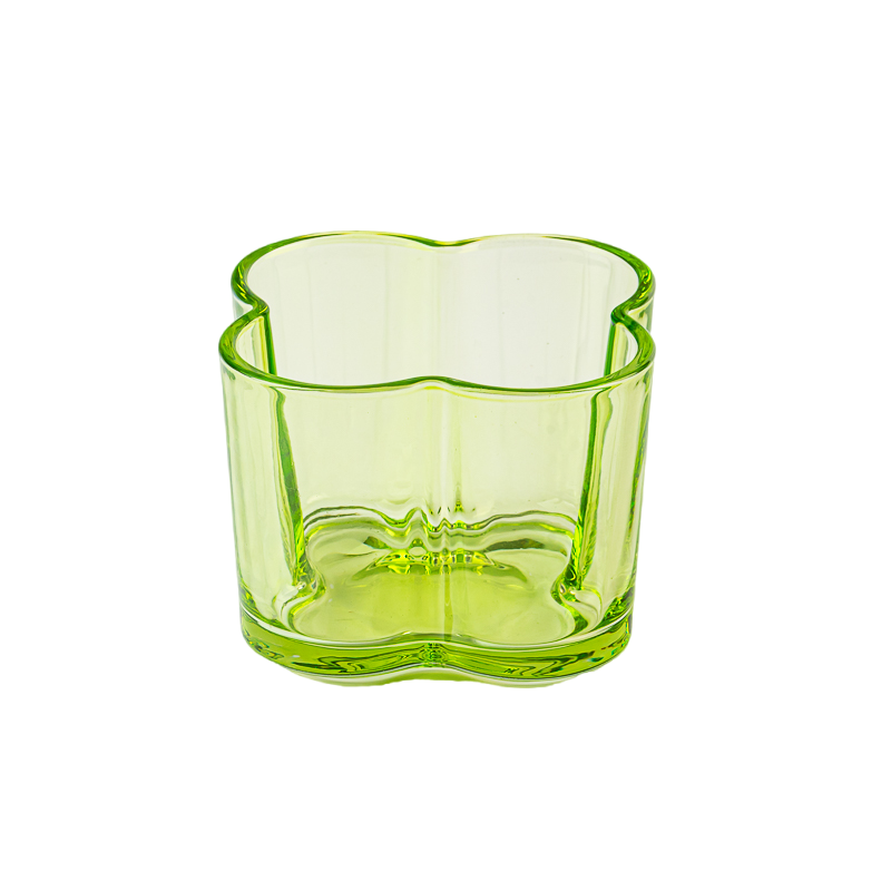 Popular green color glass candle vessel with flower design