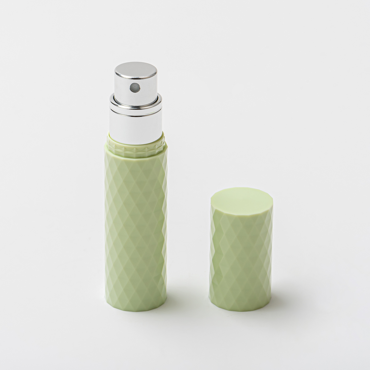 Luxuriöse 5-ml-Taschen-Parfümzerstäuber-Sprühflasche aus rautenförmigem Kunststoff