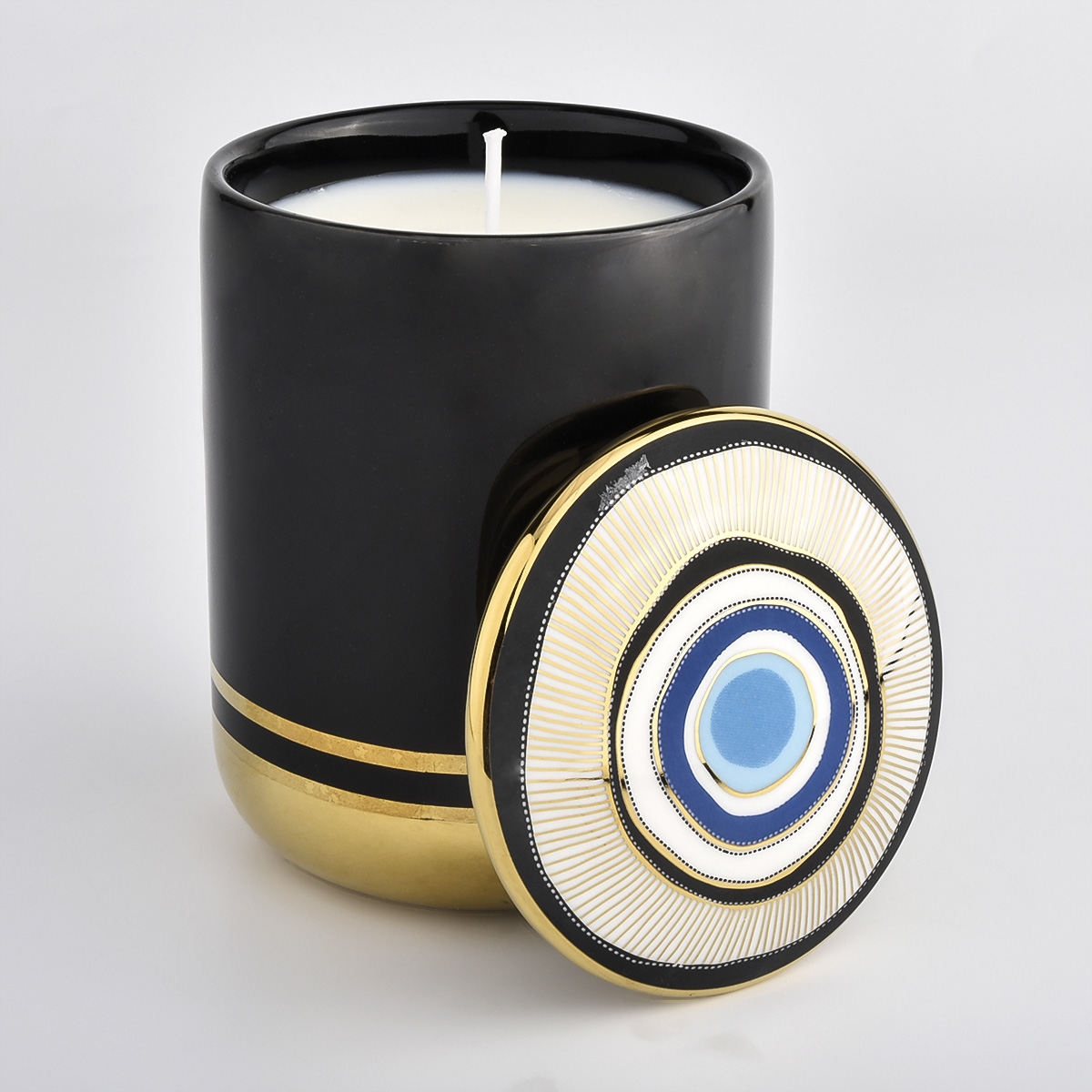 bán chạy lọ nến gốm đen và vàng có nắp